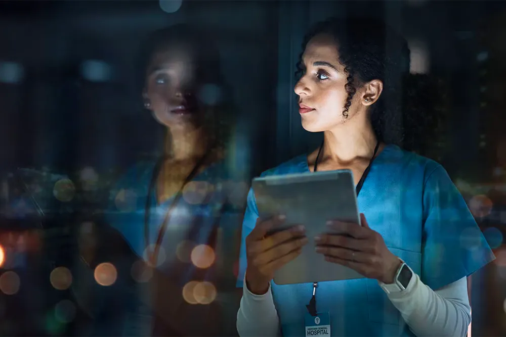 Life-Sciences-image-1000×667 VOSS for Life Sciences - healthworker looking out of window at night