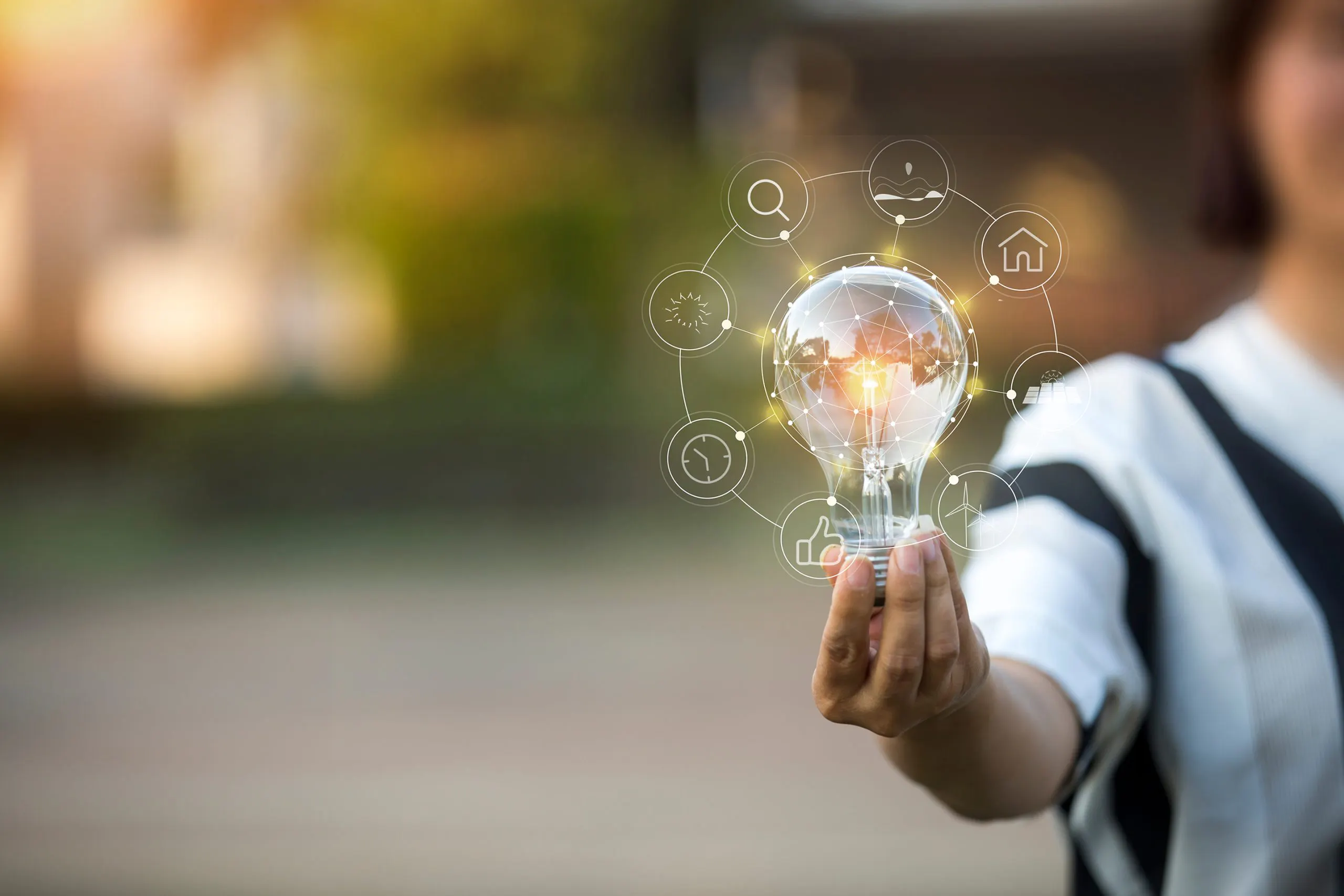Light,Bulbs,That,Grow,,In,The,Concept,Of,Energy,In VOSS innovations update video and podcast - image of girl holding lightbulb