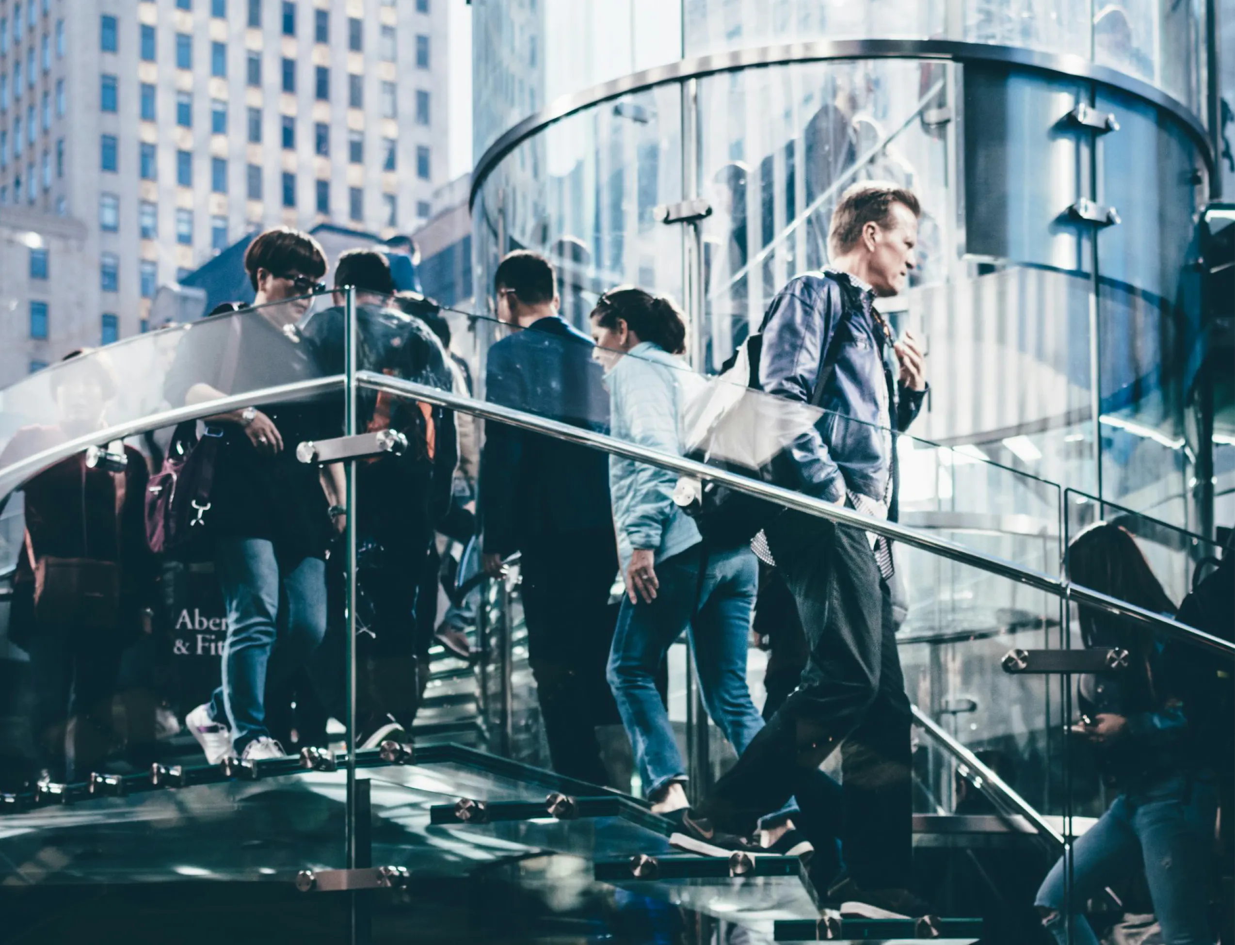 People commuting on stairway - Digital Workplace Management for Professional Services solution sheet cover image