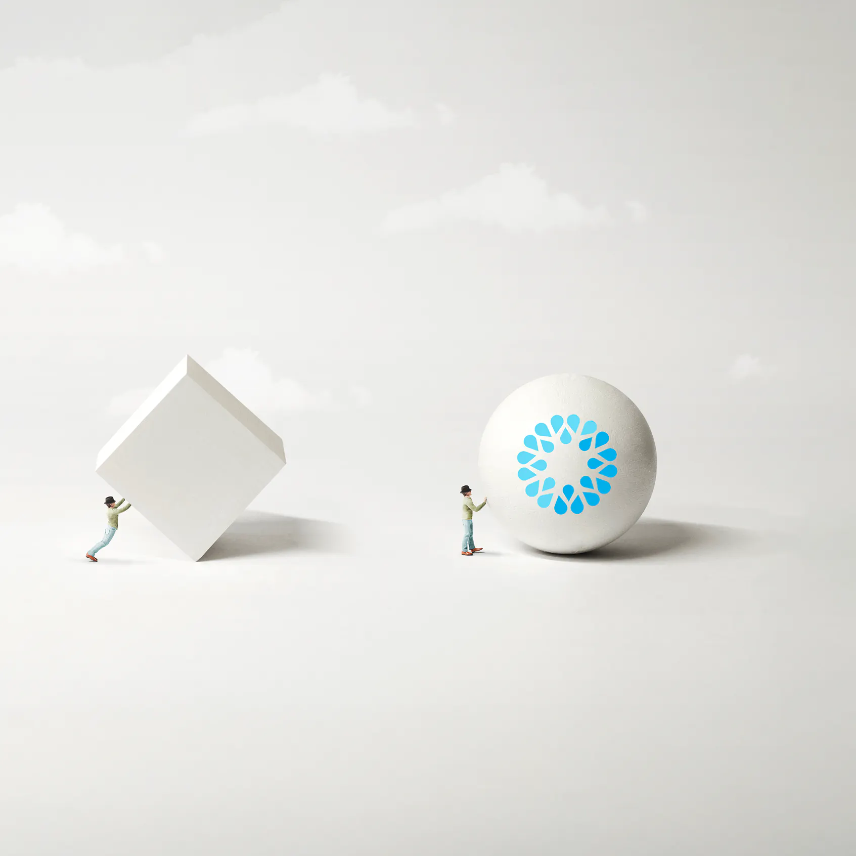 Two small figures pushing a white cube and a white sphere marked with the VOSS logo, illustrating AI-powered automation