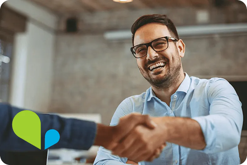 VOSS technology partners - image of happy business man shaking hands