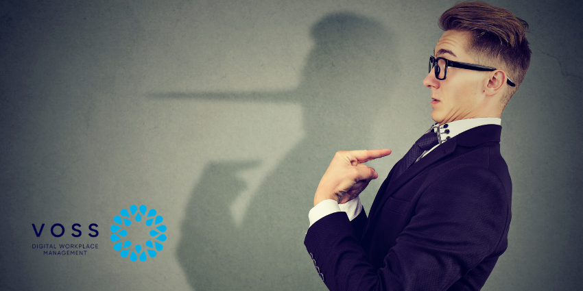 Why your meeting room data is lying to you, and how to fix it- image shows guilty businessman with his shadow with a long nose