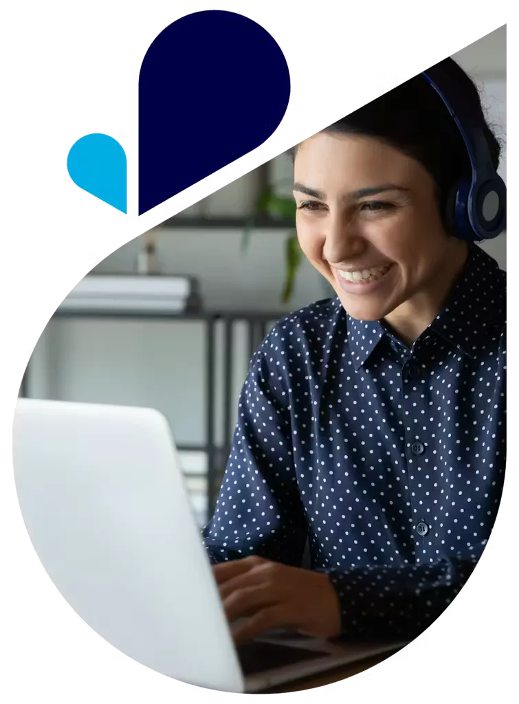 VOSS teardrop – happy woman with headset using laptop VOSS AI, automation and integration